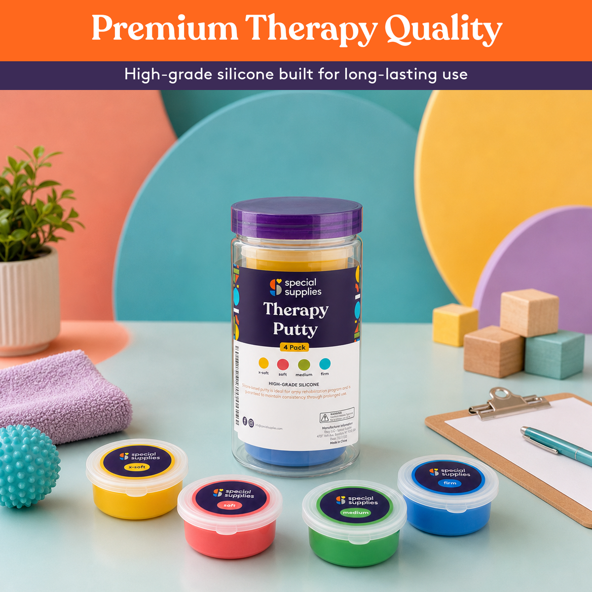 Therapy putty canister and four colored tubs on a table